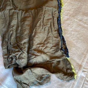 Grey scarf with yellow and blue tassels